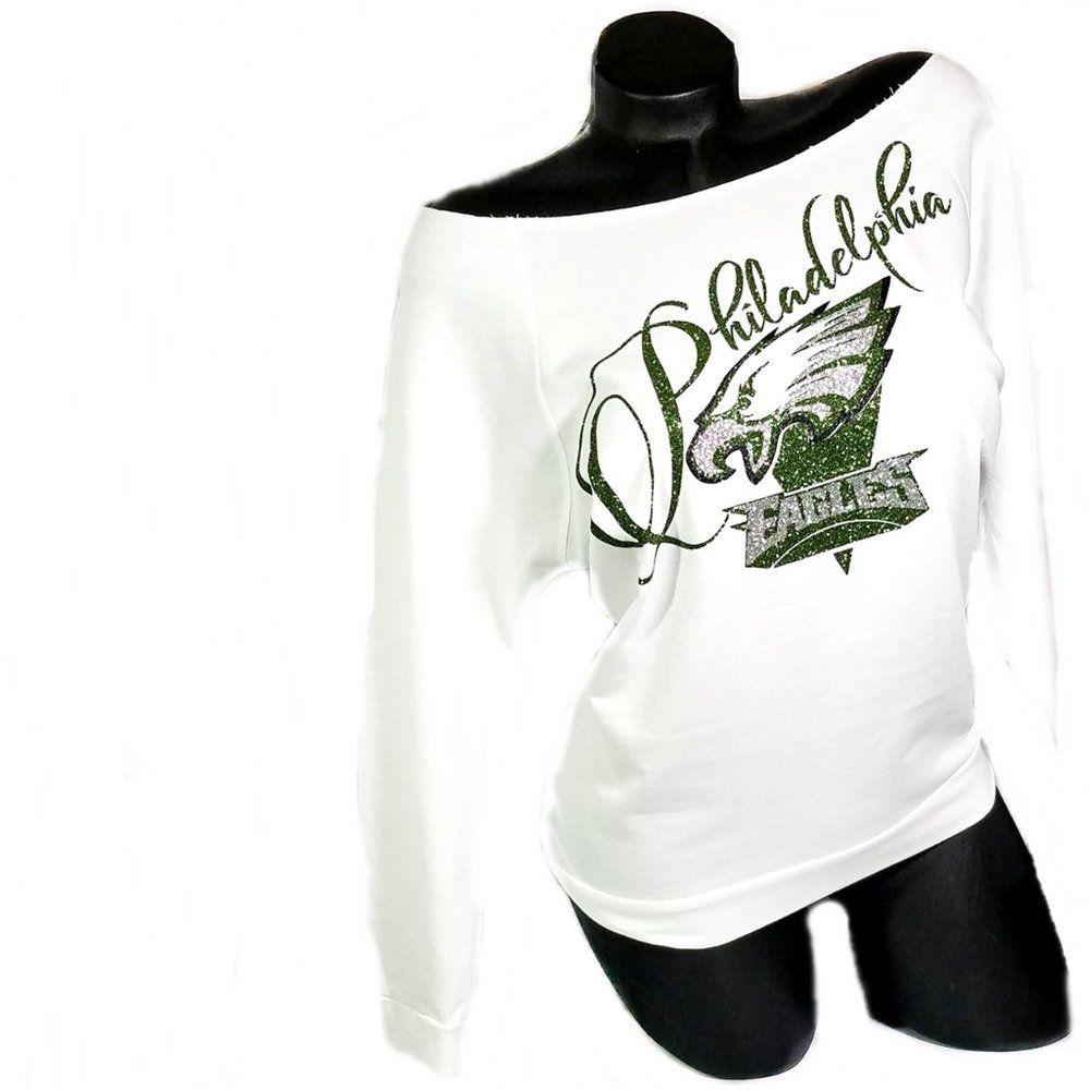 Philadelphia Eagles on a White Sweatshirt with Shiny Lettering.